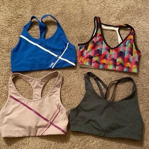 Lot of 4 sports bras size M
